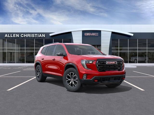 2026 GMC Acadia AT4 in Volcanic Red Tintcoat — front three-quarter view