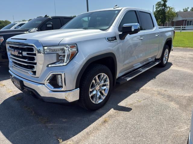 2021 GMC Sierra 1500 SLT in Quicksilver Metallic — front three-quarter view